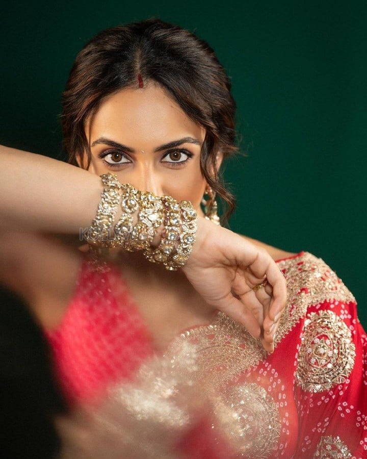 Ravishing Rakul Preet Singh in a Royal Red Saree with a Matching Sleeveless Blouse Pictures 04