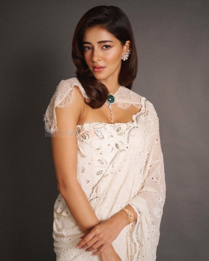 Regal Beauty Ananya Panday in a Manish Malhotra White Lace Saree and Corset Blouse with a Lace Cape Pictures 01