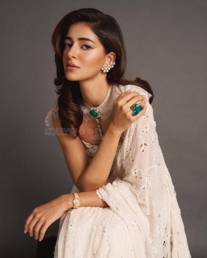 Regal Beauty Ananya Panday in a Manish Malhotra White Lace Saree and Corset Blouse with a Lace Cape Pictures 03