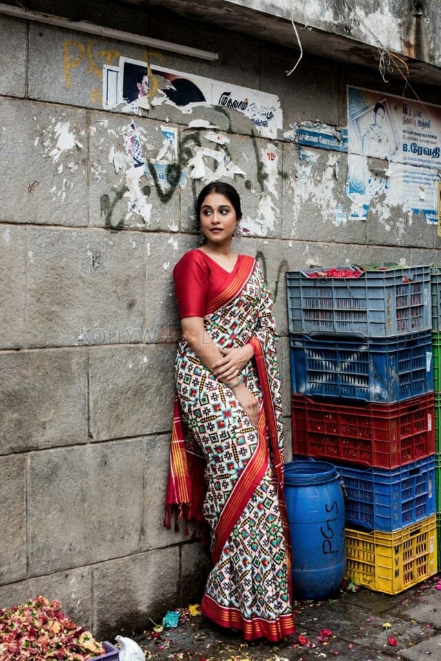 Regina Cassandra in a Printed Saree and Red Blouse Photo 01