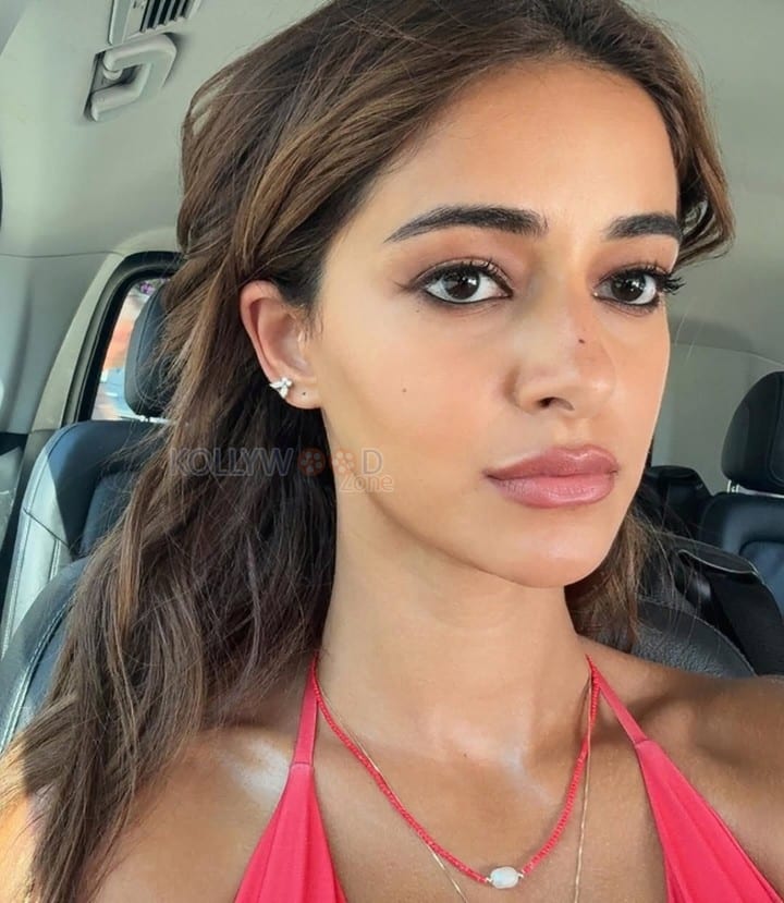 Sexy Ananya Panday in a Coral Colored Cutout Monokini with Thigh High Slit Dress 01