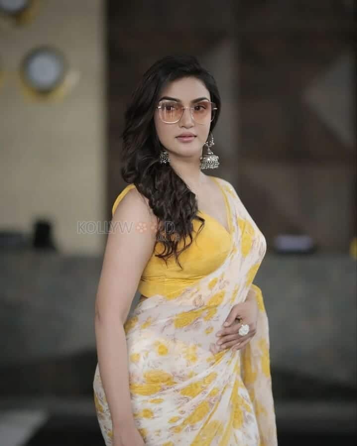 Sexy Honey Rose in a White Yellow Saree Photo 02