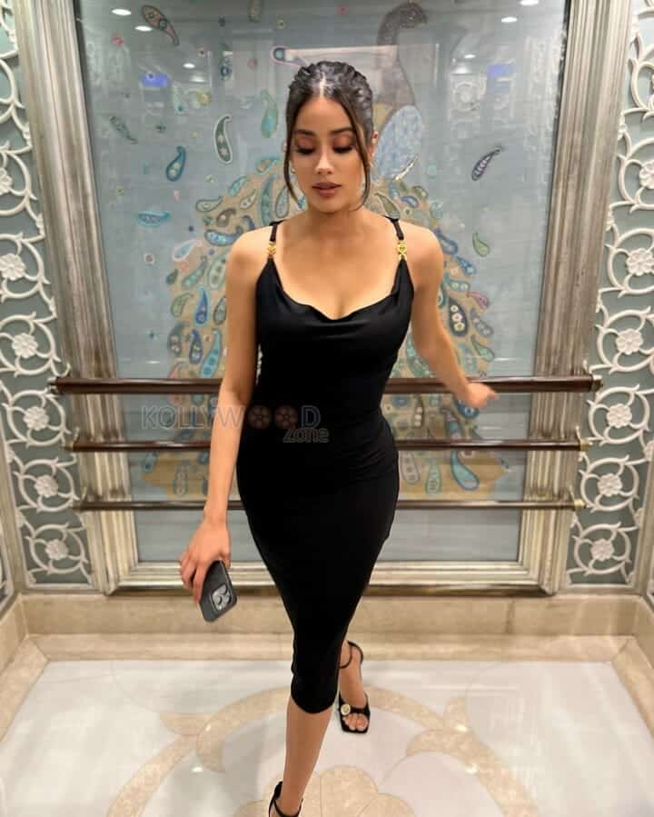 Sexy Janhvi Kapoor in a Noodle Strap Black Dress Photos 02