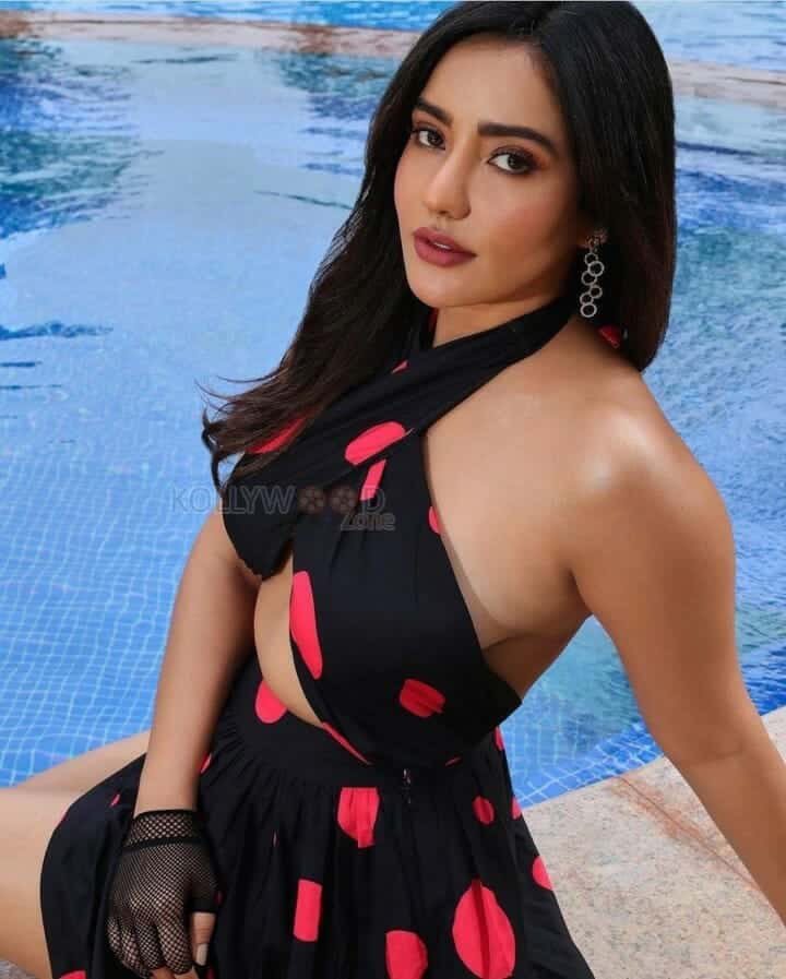 Sexy Neha Sharma near the Swimming Pool Photo 01