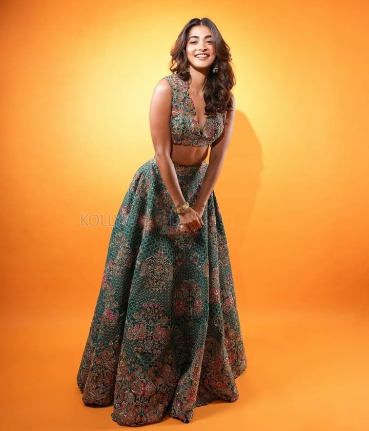 Sexy Pooja Hegde in a Mudra Green Lehenga with Organza Dupatta with Resham and Zardozi Embroidery Plunging Scalloped Neckline Photos 01