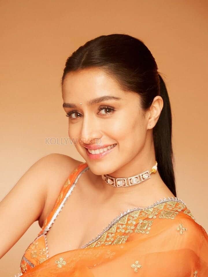 Shraddha Kapoor In a Transparent Orange Saree Photo 01