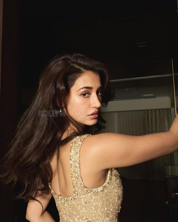 Sizzling Disha Patani in a Golden Embellished Bodycon Dress at Vivienne Westwoods Fashion Show Photos 03