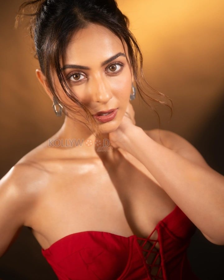 Sizzling Hot Rakul Preet Singh in a Red Corset Strapless Top with a Thigh High Slit Skirt Photos 01
