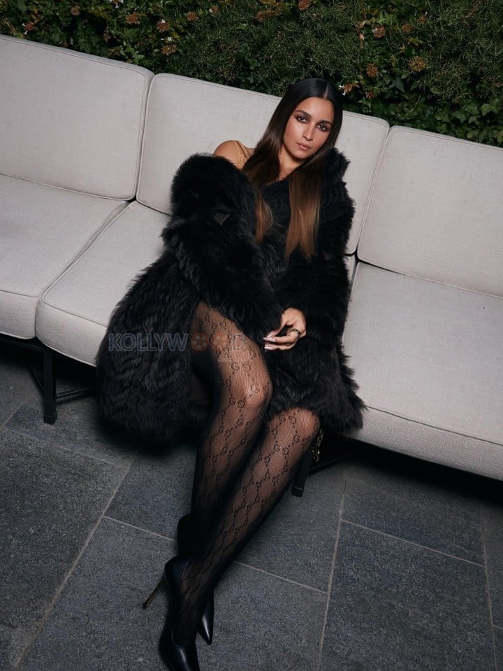 Stunning Alia Bhatt at New Year Fashion Week in a Nude Satin Mini Dress with a Black Fur Coat Photos 01