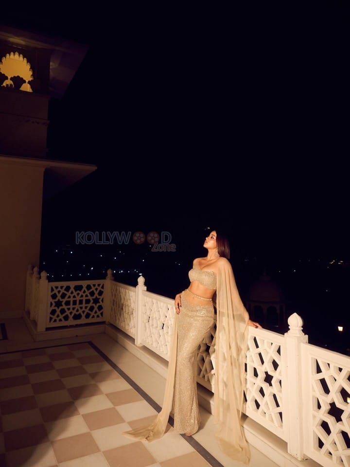 Stunning Bollywood Beauty Janhvi Kapoor in a Manish Malhotra Body Hugging Lehenga with an Off Shoulder Blouse and Sheer Dupatta Photos 01