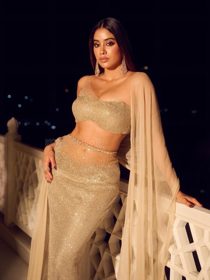 Stunning Bollywood Beauty Janhvi Kapoor in a Manish Malhotra Body Hugging Lehenga with an Off Shoulder Blouse and Sheer Dupatta Photos 02