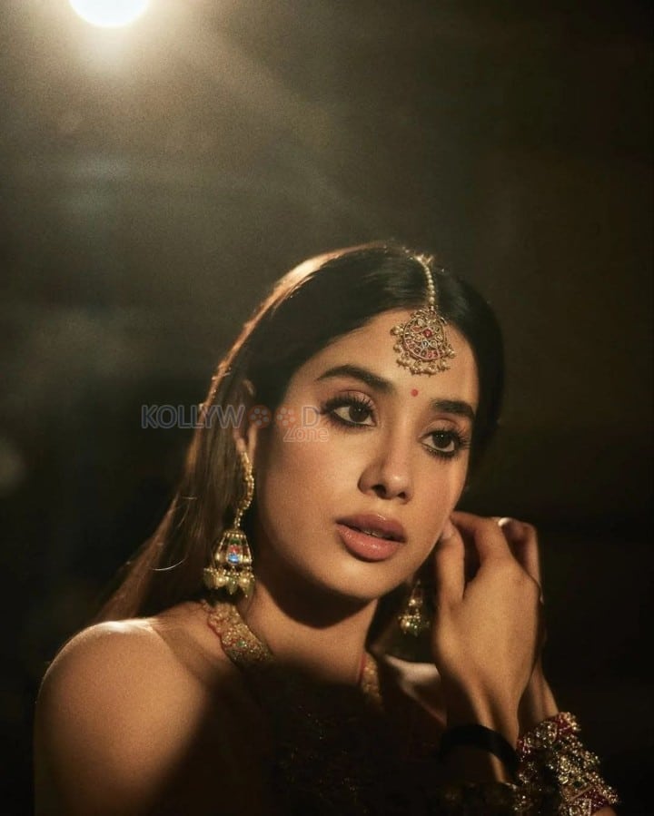 Stunning Janhvi Kapoor in a Red Rimple and Harpreet Lehenga with a Heavily Embellished Sleeveless Choli Photos 01