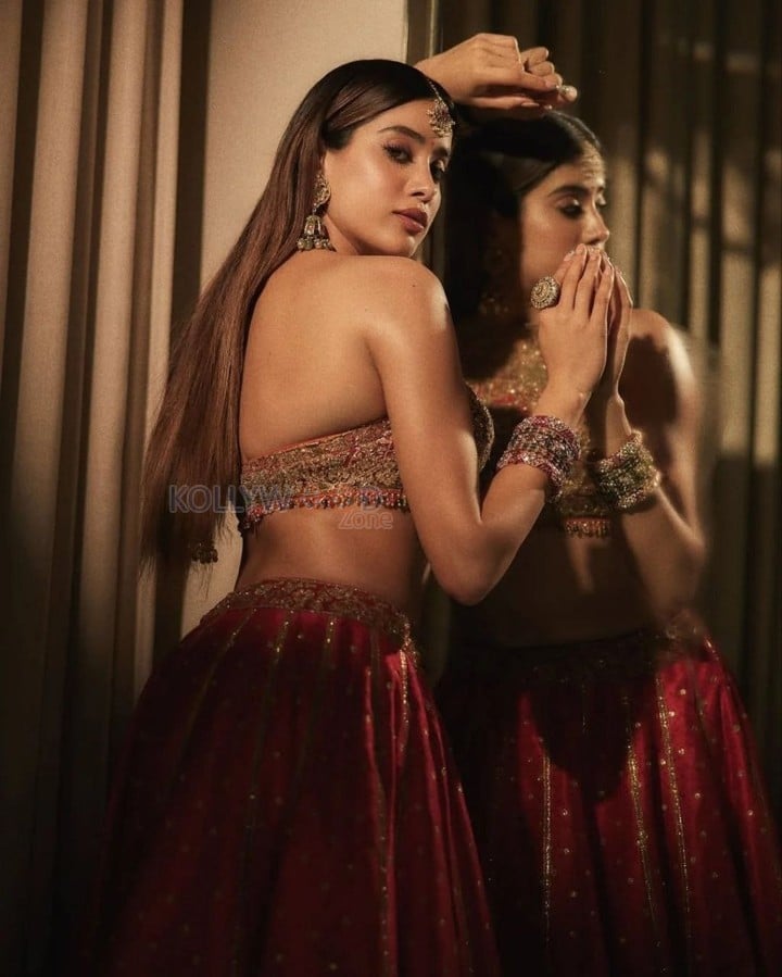 Stunning Janhvi Kapoor in a Red Rimple and Harpreet Lehenga with a Heavily Embellished Sleeveless Choli Photos 02
