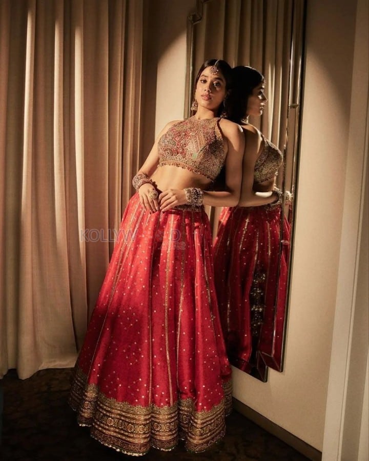 Stunning Janhvi Kapoor in a Red Rimple and Harpreet Lehenga with a Heavily Embellished Sleeveless Choli Photos 03