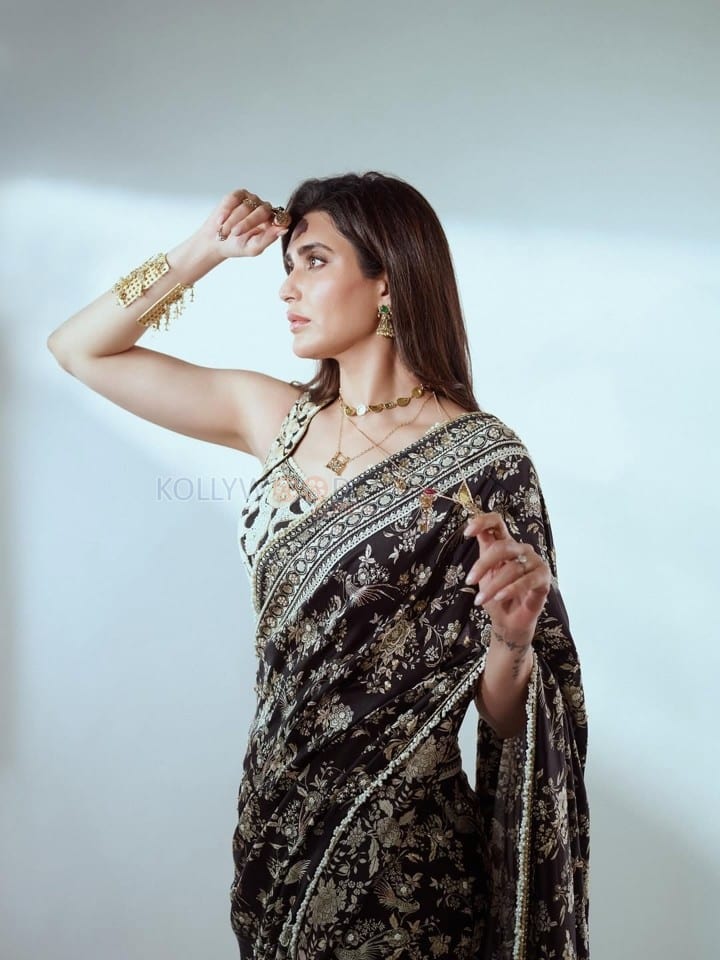 Stunning Karishma Tanna in a Black Printed Saree with a White Embroidered Blouse Pictures 01