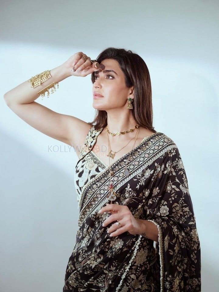Stunning Karishma Tanna in a Black Printed Saree with a White Embroidered Blouse Pictures 02