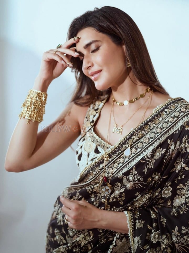 Stunning Karishma Tanna in a Black Printed Saree with a White Embroidered Blouse Pictures 03