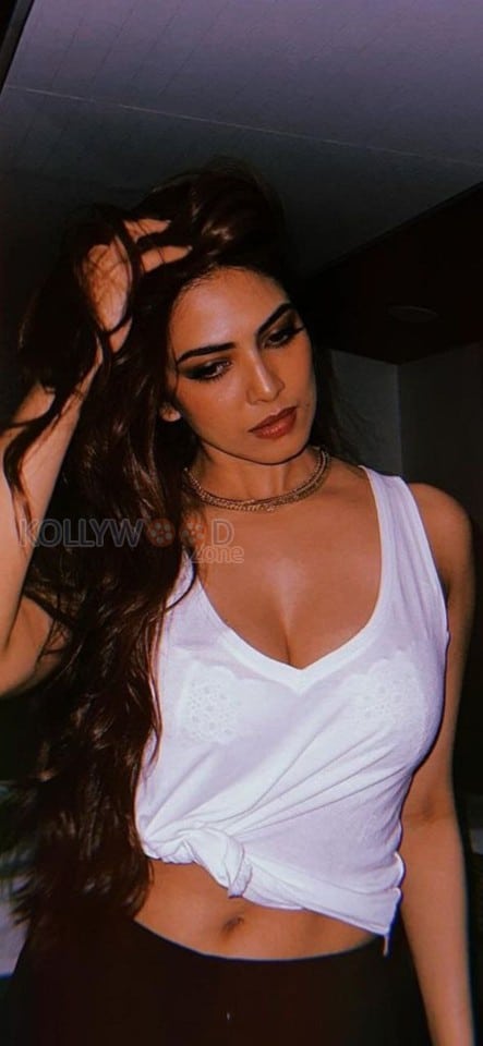 Stunning Malavika Mohanan in a See Through White Top with Lace Bra Photos 01
