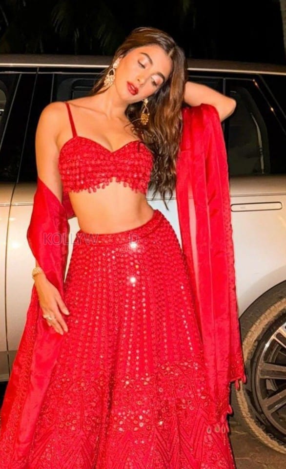Stunning Pooja Hegde in a Dark Red Sequin Lehenga Photos 02