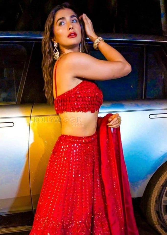 Stunning Pooja Hegde in a Dark Red Sequin Lehenga Photos 04