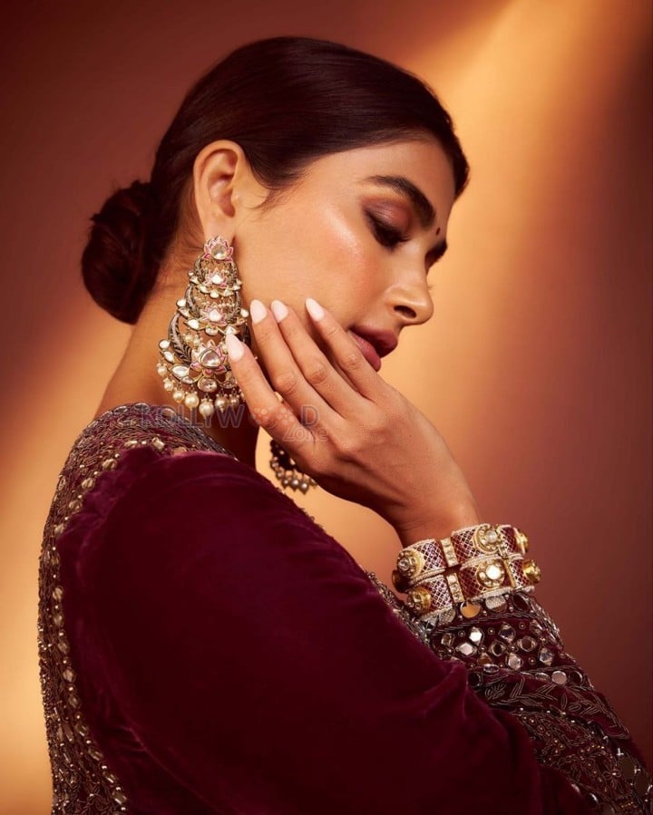 Stunning Pooja Hegde in a Velvet Salwar Kurta Photos 01