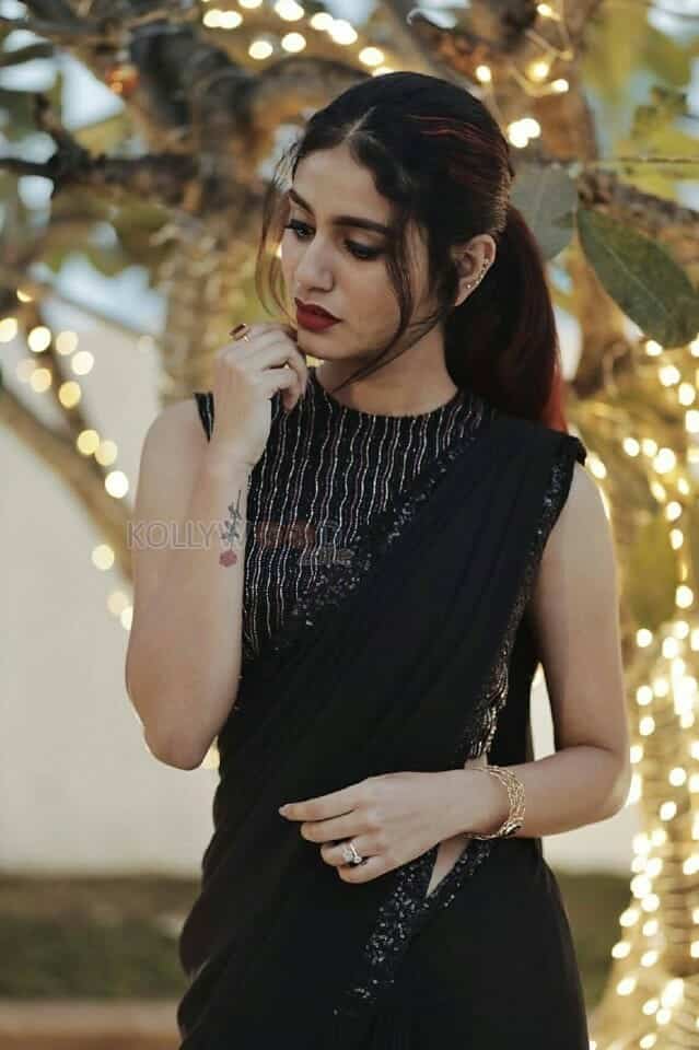 Stunning Priya Prakash Varrier in Black Georgette Embellished Saree Style Dress Photos 02