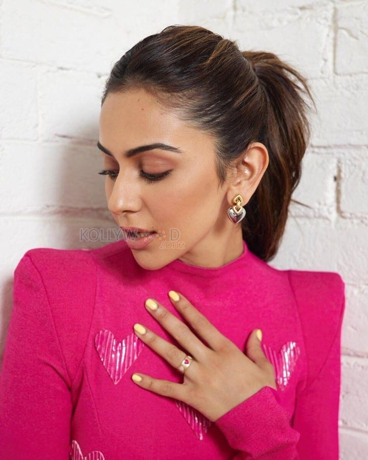 Stunning Rakul Preet Singh in a Pink Turtleneck Bodycon Dress with Sparkling Hearts Photos 01