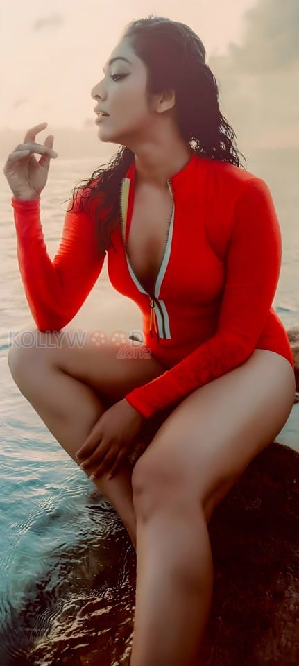 Stunning Rima Kallingal in a Red One Piece Swimsuit Pictures 03