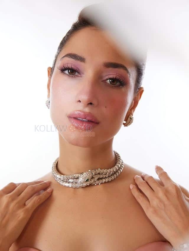 Stunning Tamannaah Bhatia in a Pink Off Shoulder Satin Gown with a Sweetheart Neckline and Bow for Bvlgari iconic Serpenti Collection Photos 03