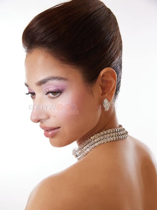 Stunning Tamannaah Bhatia in a Pink Off Shoulder Satin Gown with a Sweetheart Neckline and Bow for Bvlgari iconic Serpenti Collection Photos 07