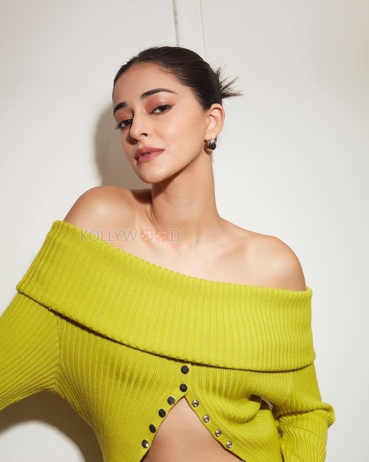 Stylish Ananya Panday in a Green Off Shoulder Knitted Blouse and Denim Jeans Photos 04