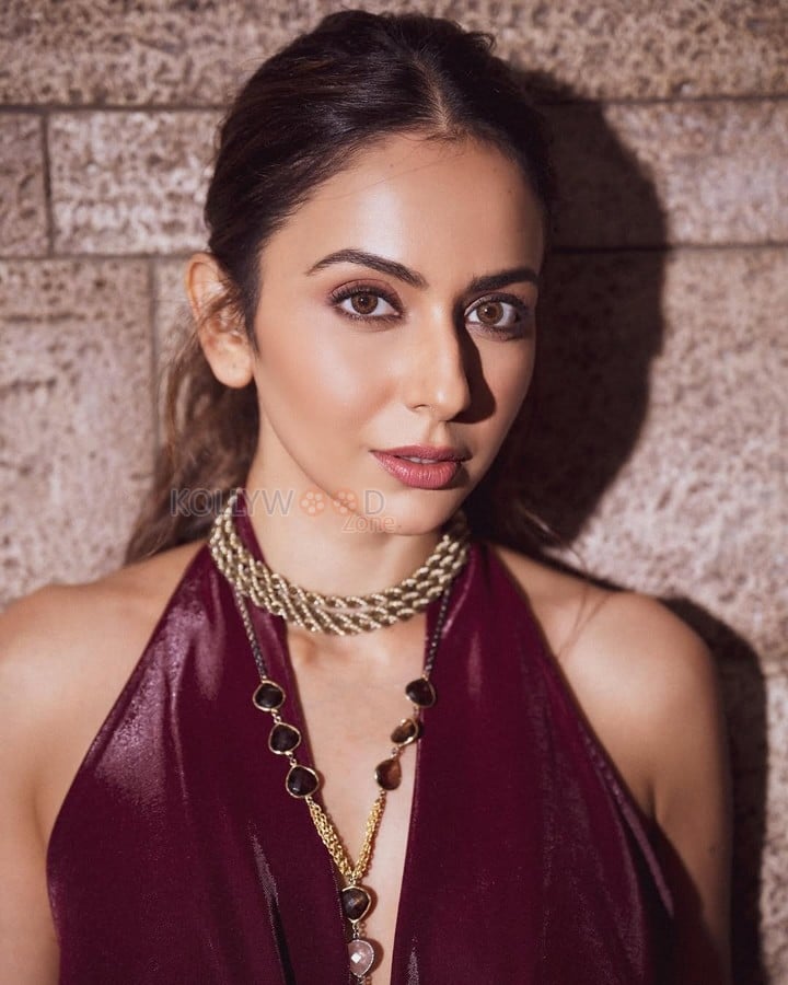 Stylish Hot Rakul Preet Singh in a Red Metallic Draped Dress with a Halterneck and Thigh Slit Photos 03
