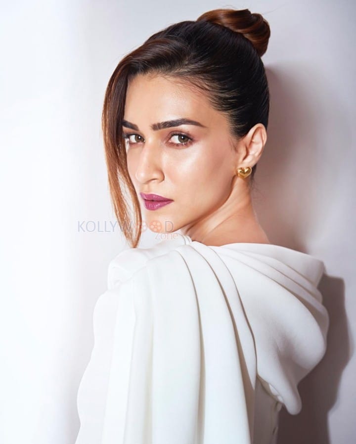 Stylish Kriti Sanon in a White Bodycon Dress Stills 02
