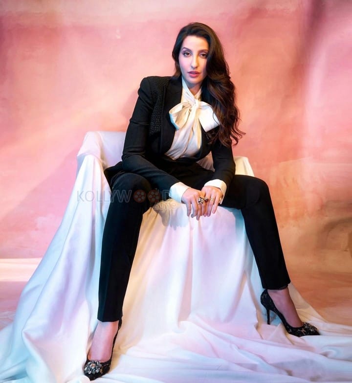 Stylish Nora Fatehi in a Black Power Suit Photos 02