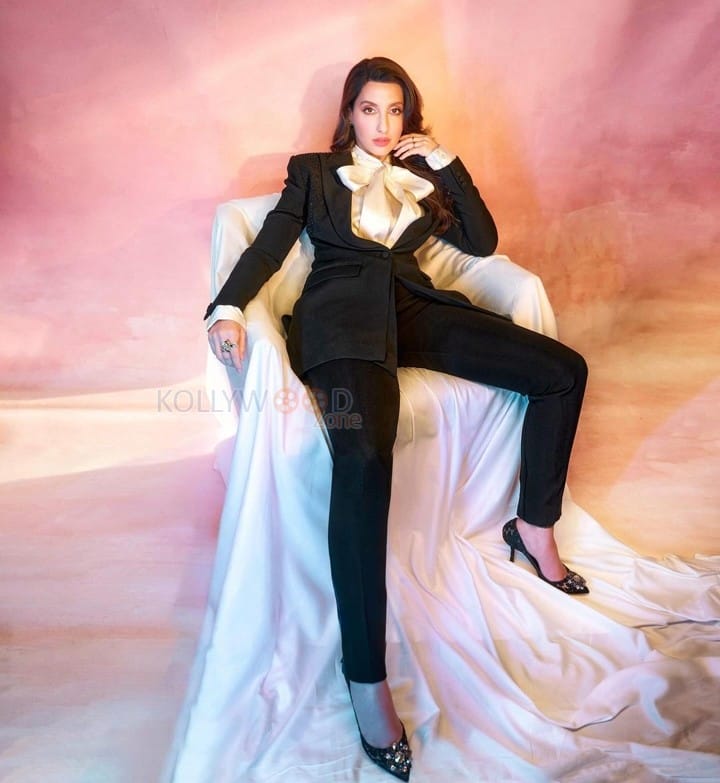 Stylish Nora Fatehi in a Black Power Suit Photos 03