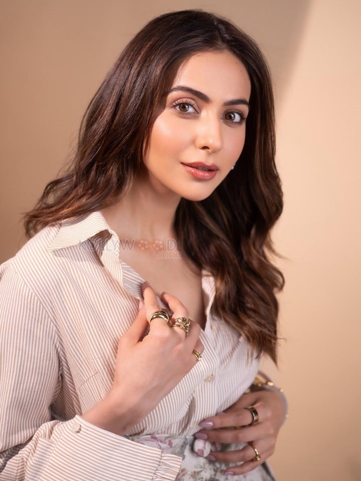 Stylish Rakul Preet Singh in a Floral Corset Mini Dress with a Striped Shirt Photos 02