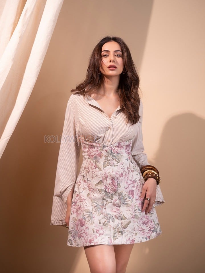 Stylish Rakul Preet Singh in a Floral Corset Mini Dress with a Striped Shirt Photos 09