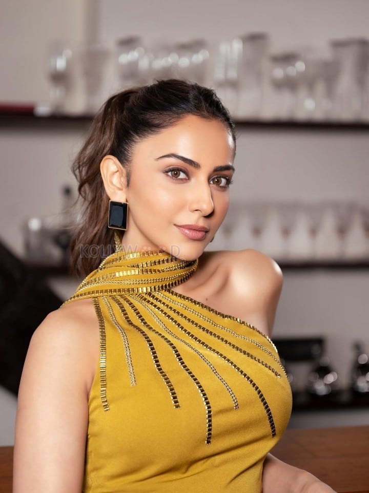 Stylish Rakul Preet Singh in a Yellow Dress Pictures 02