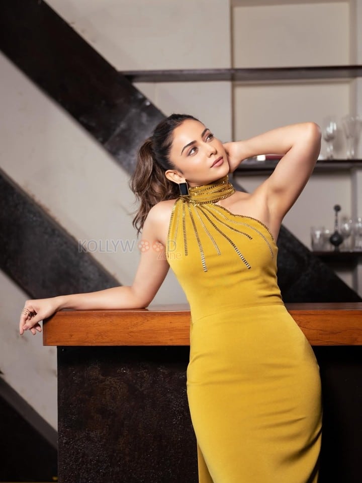 Stylish Rakul Preet Singh in a Yellow Dress Pictures 03