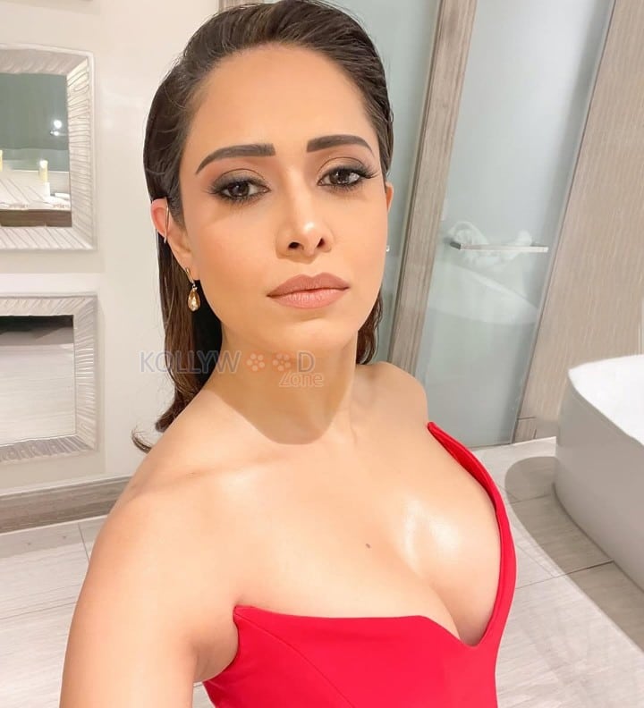 Super Sexy Nushrratt Bharuccha in a Red Off Shoulder Maxi Dress Photos 03