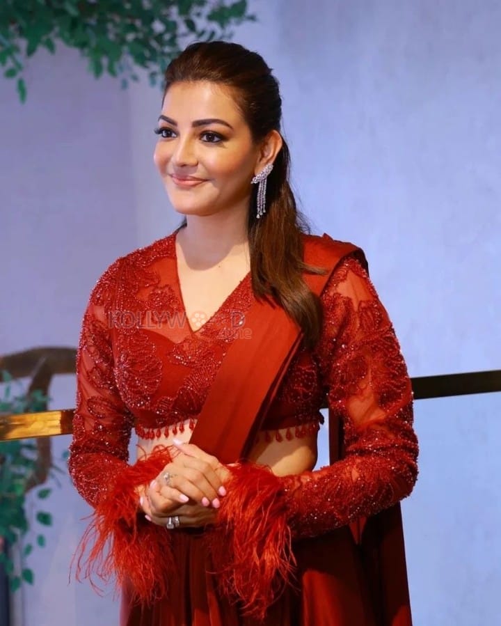 Swapna Sundari Kajal Aggarwal in a Red Saree Photos 02