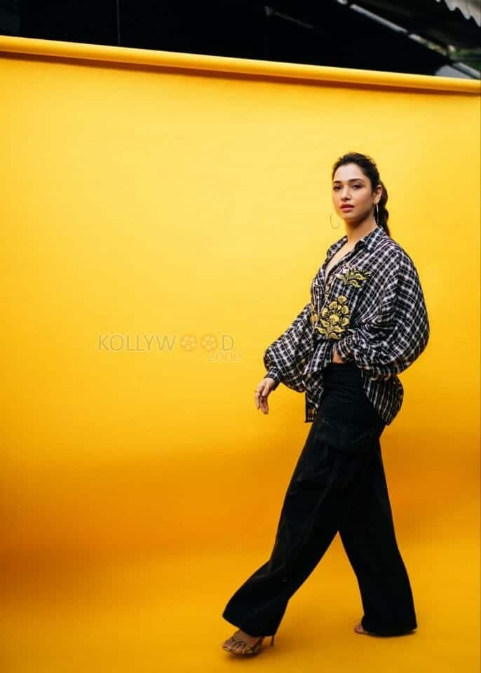 Tamanna Walking in a Black Baggy Pant 01