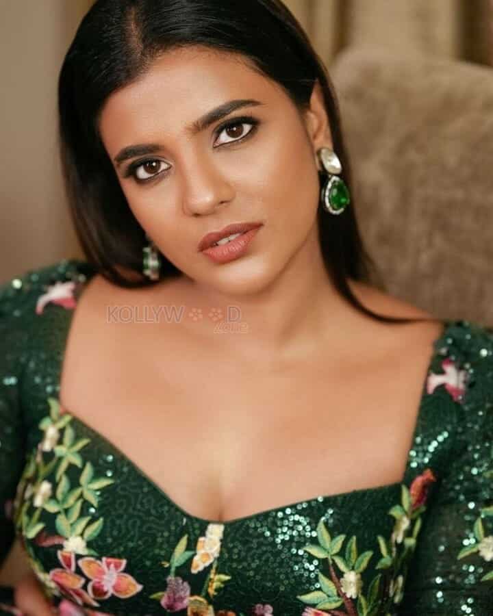 Tamil Actress Aishwarya Rajesh in a Green Floral Dress Pictures 04