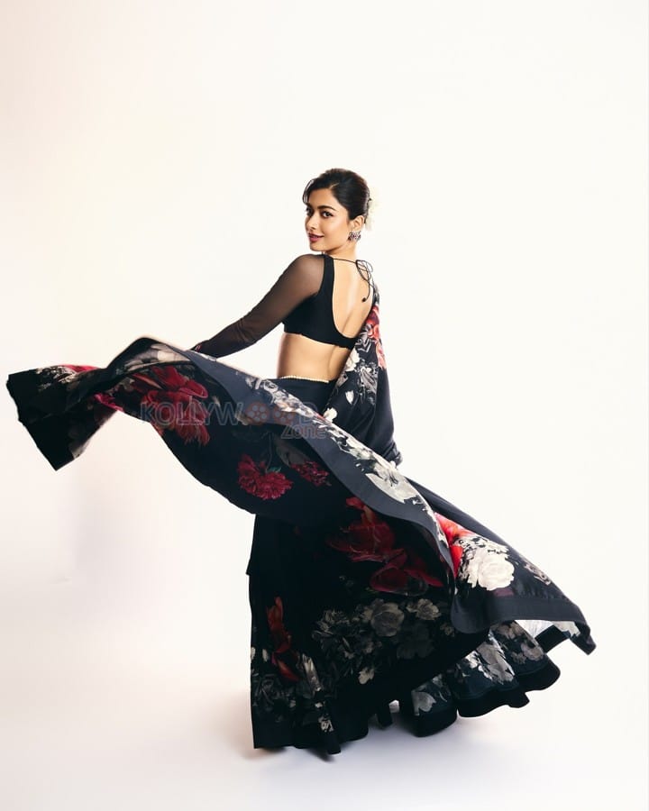 Thamma Actress Rashmika Mandanna in a Black Floral Lehenga with a Sheer Full Sleeve Blouse Pictures 02