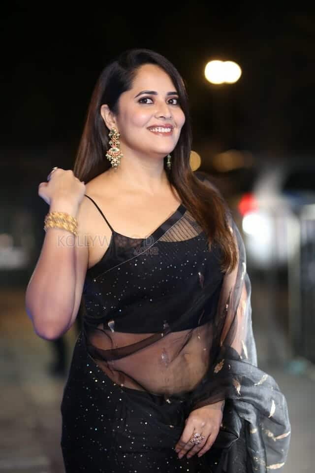 Actress Anasuya Bharadwaj at Pedha Kapu 1 Movie Pre Release Event Glam Photos 01
