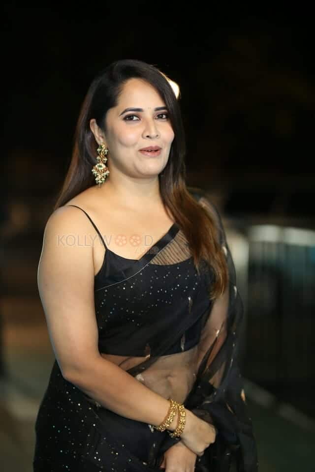 Actress Anasuya Bharadwaj at Pedha Kapu 1 Movie Pre Release Event Glam Photos 02