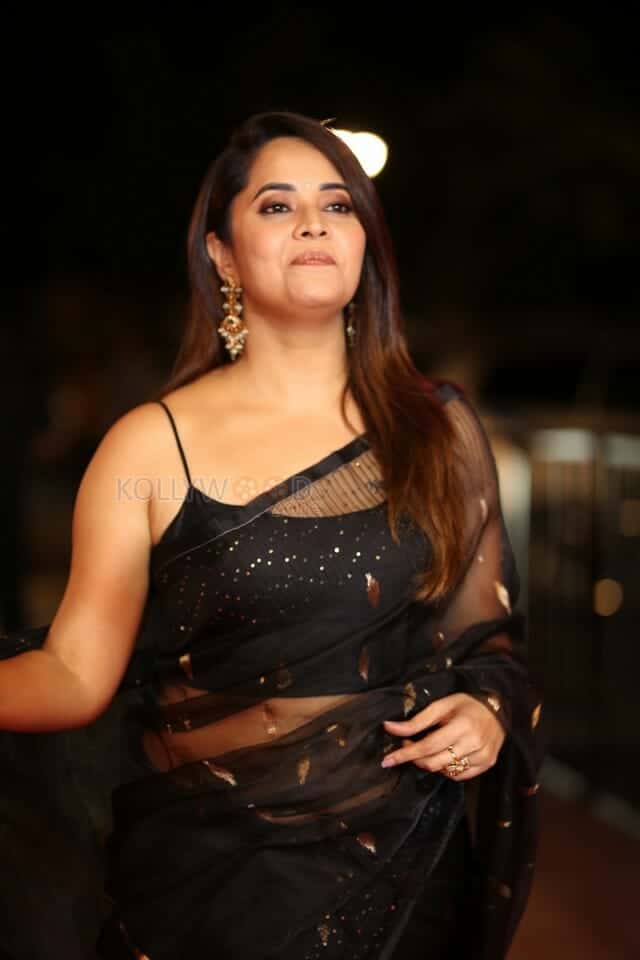 Actress Anasuya Bharadwaj at Pedha Kapu 1 Movie Pre Release Event Glam Photos 04