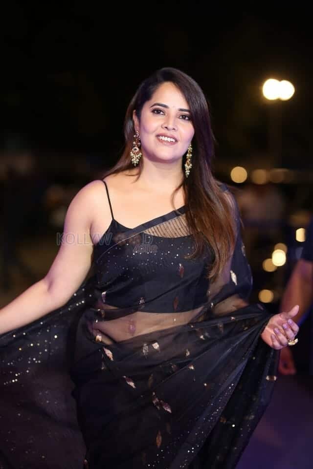 Actress Anasuya Bharadwaj at Pedha Kapu 1 Movie Pre Release Event Glam Photos 11