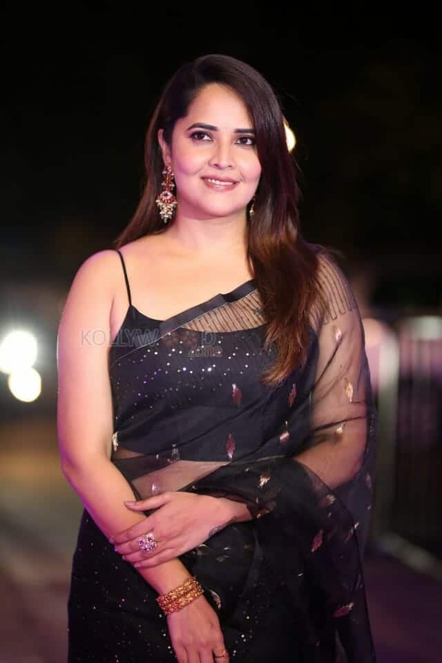 Actress Anasuya Bharadwaj at Pedha Kapu 1 Movie Pre Release Event Glam Photos 15