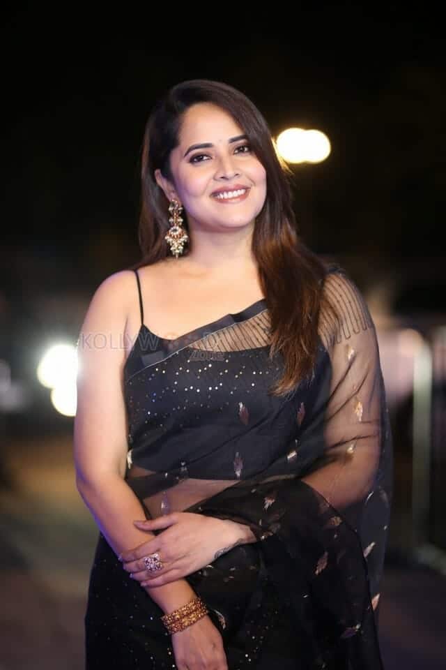 Actress Anasuya Bharadwaj at Pedha Kapu 1 Movie Pre Release Event Glam Photos 16